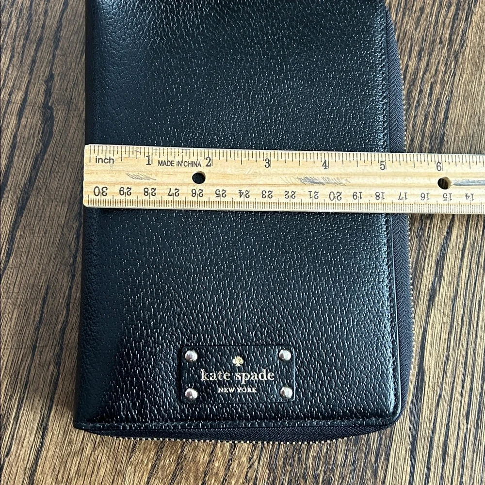 Black leather Kate Spade Wellesley zip around personal organizer/planner